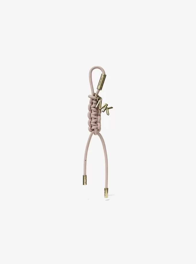 Adorno para bolso con cordón trenzado y tono dorado Adorno para bolso con cordón trenzado y tono dorado