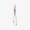 Adorno para bolso con cordón trenzado y tono dorado Adorno para bolso con cordón trenzado y tono dorado