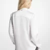 Blusa de satén con flecos y lazo en el cuello Blusa de satén con flecos y lazo en el cuello