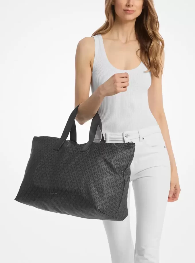 Bolsa de mano reversible y plegable con el logotipo de la firma impreso de Tanner de gran tamaño Bolsa de mano reversible y plegable con el logotipo de la firma impreso de Tanner de gran tamaño