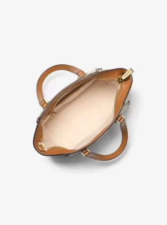 Bolso bandolera convertible de piel y logo de la firma Taryn Small