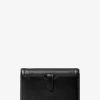 Bolso bandolera convertible para smartphone Jet Set Small de piel granulada