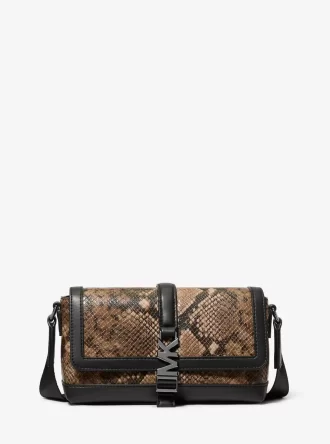 Bolso bandolera Cyrus pequeño con relieve de serpiente