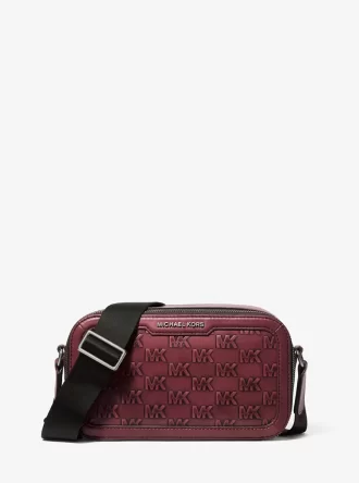 Bolso bandolera de piel bruñida con el logotipo de Hudson en relieve