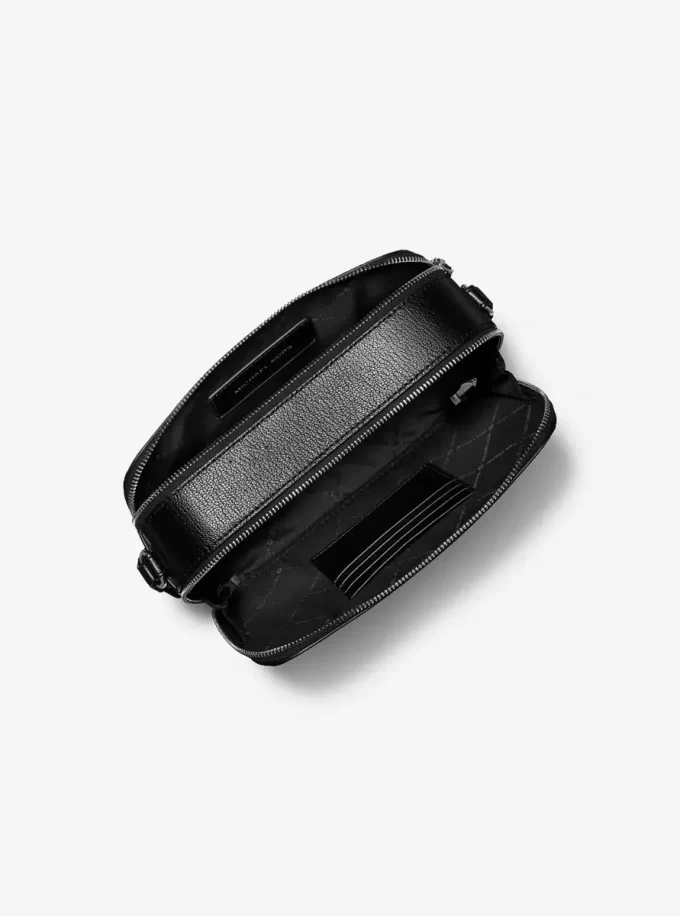 Bolso bandolera Hudson de piel con ojales Bolso bandolera Hudson de piel con ojales