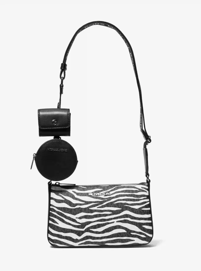 Bolso bandolera Jet Set Leather mediano con estampado animal y logotipo, con estuche para Apple AirPods Pro®.