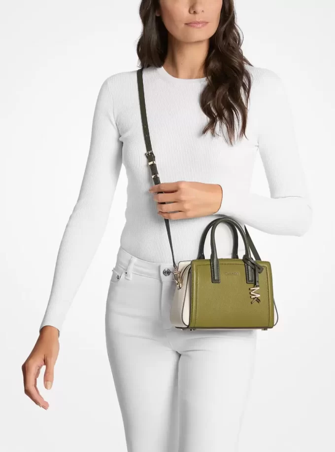 Bolso bandolera Laila extrapequeño de piel granulada con bloques de color Bolso bandolera Laila extrapequeño de piel granulada con bloques de color