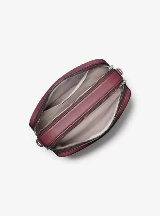 Bolso bandolera mediano Bryant para cámara de piel bruñida