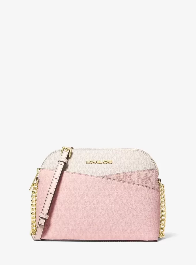 Bolso bandolera mediano Jet Set Travel con logo de la firma y bloques de color