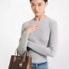 Bolso bandolera Mercer mediano con logo y acordeón de piel
