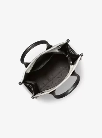 Bolso bandolera Mirella pequeño con logo sombreado y distintivo
