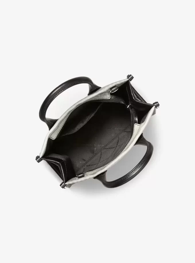 Bolso bandolera Mirella pequeño con logo sombreado y distintivo