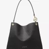 Bolso de hombro grande con logotipo de la firma Christina Bolso de hombro grande con logotipo de la firma Christina