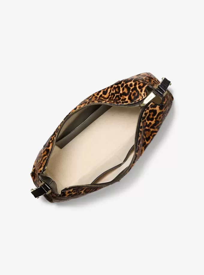 Bolso de hombro mediano de pelo de becerro con estampado de leopardo de Nolita Bolso de hombro mediano de pelo de becerro con estampado de leopardo de Nolita