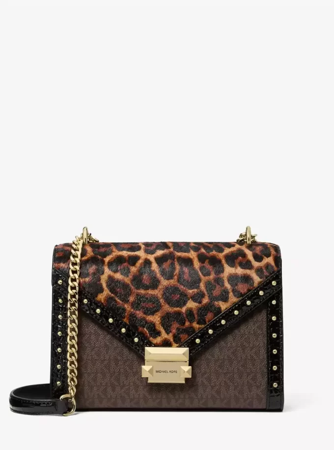 Bolso de hombro Whitney de pelo de becerro con estampado de leopardo y logotipo característico