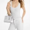 Bolso pequeño Sheila con patchwork con tachuelas y logotipo distintivo
