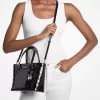 Bolso tote convertible Jet Set extrapequeño con logotipo de patente en relieve