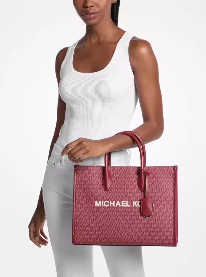Bolso tote mediano metálico Mirella con logotipo de la firma Bolso tote mediano metálico Mirella con logotipo de la firma