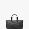 Bolso tote plegable reversible con logotipo de la firma impreso de Tanner Bolso tote plegable reversible con logotipo de la firma impreso de Tanner