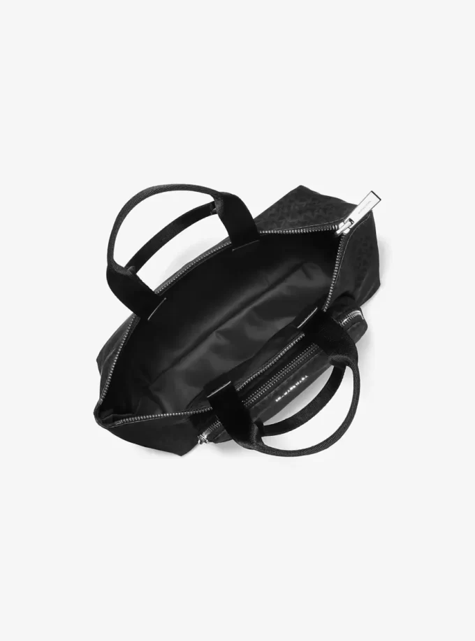Bolso tote plegable reversible con logotipo de la firma impreso de Tanner Bolso tote plegable reversible con logotipo de la firma impreso de Tanner