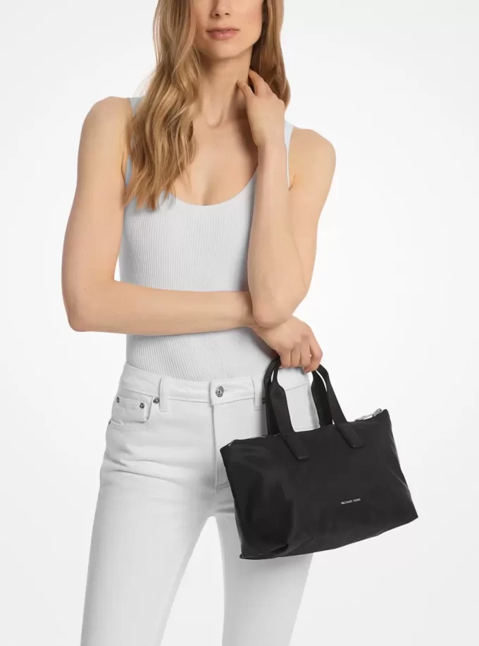 Bolso tote plegable reversible con logotipo de la firma impreso de Tanner Bolso tote plegable reversible con logotipo de la firma impreso de Tanner