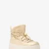 Bota con cordones metalizada Romey Bota con cordones metalizada Romey