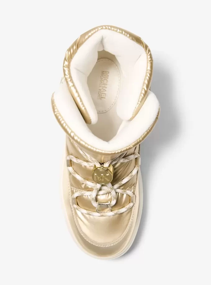 Bota con cordones metalizada Romey Bota con cordones metalizada Romey