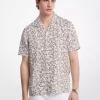 Camisa de lino floral estilo campamento