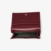 Cartera de cuero bruñido con el logotipo de Hudson en relieve