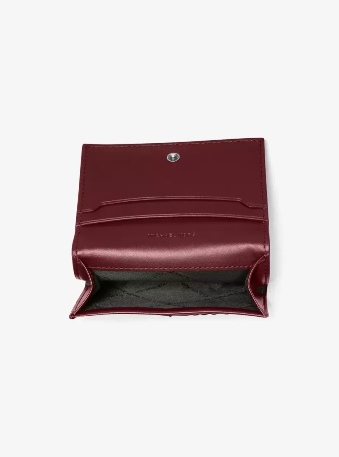 Cartera de cuero bruñido con el logotipo de Hudson en relieve