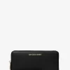 Cartera de pulsera grande de piel granulada Jet Set Travel