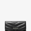 Cartera grande acolchada de tres pliegues Jet Set Travel Cartera grande acolchada de tres pliegues Jet Set Travel