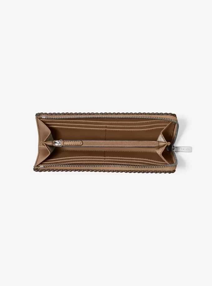 Cartera grande Jet Set de piel granulada con cremallera de un cuarto Cartera grande Jet Set de piel granulada con cremallera de un cuarto