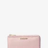 Cartera grande Jet Set Travel de piel granulada con cremallera de un cuarto Cartera grande Jet Set Travel de piel granulada con cremallera de un cuarto