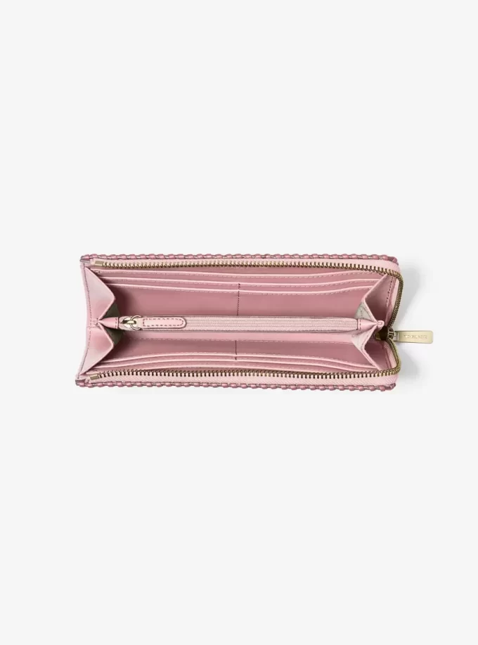 Cartera grande Jet Set Travel de piel granulada con cremallera de un cuarto Cartera grande Jet Set Travel de piel granulada con cremallera de un cuarto