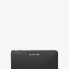 Cartera grande Jet Set Travel de piel saffiano con cremallera de un cuarto Cartera grande Jet Set Travel de piel saffiano con cremallera de un cuarto
