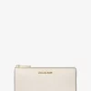 Cartera grande Jet Set Travel de piel saffiano con cremallera de un cuarto Cartera grande Jet Set Travel de piel saffiano con cremallera de un cuarto