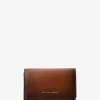 Cartera mediana Bryant de piel bruñida Cartera mediana Bryant de piel bruñida