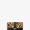 Cartera Nolita mediana plegable de piel de becerro y cuero con estampado de leopardo