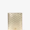 Cartera para pasaporte Jet Set Medium con logotipo metálico grabado Cartera para pasaporte Jet Set Medium con logotipo metálico grabado