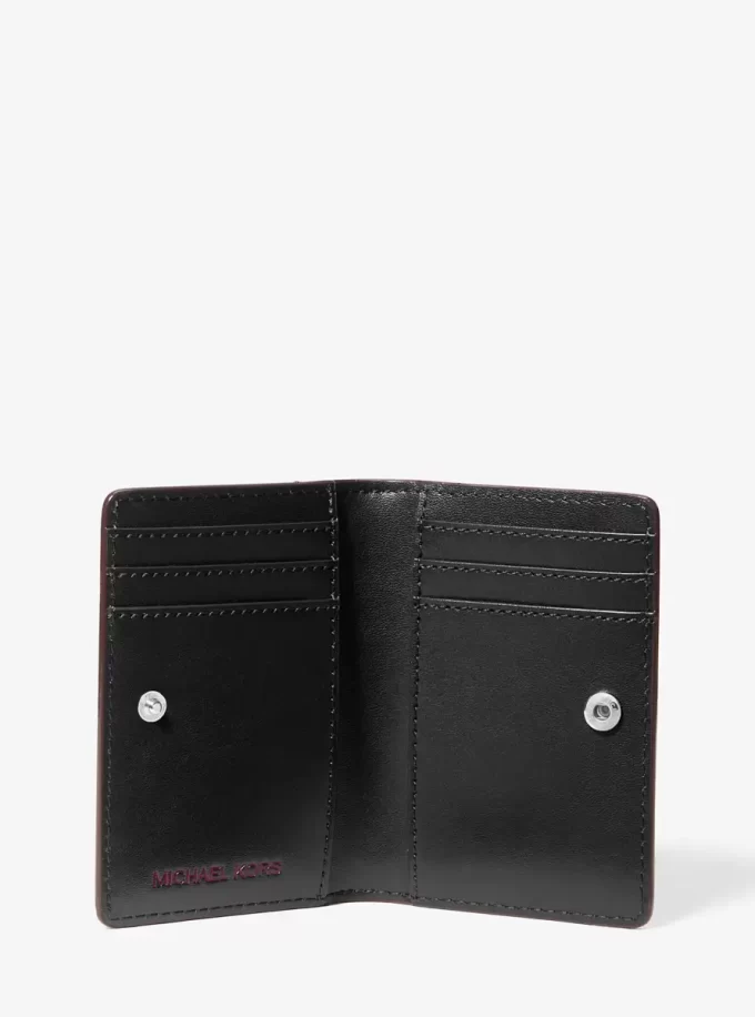Cartera pequeña plegable metálica Jet Set Cartera pequeña plegable metálica Jet Set