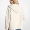 Chaqueta con capucha de sherpa