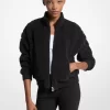 Chaqueta sherpa con cremallera y jacquard con logo