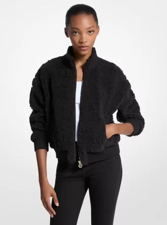 Chaqueta sherpa con cremallera y jacquard con logo