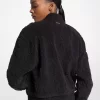 Chaqueta sherpa con cremallera y jacquard con logo