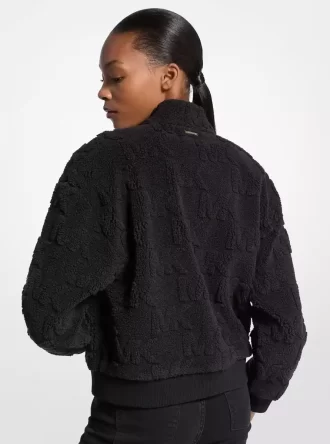 Chaqueta sherpa con cremallera y jacquard con logo
