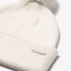 Conjunto de gorro y bufanda de punto adornados Conjunto de gorro y bufanda de punto adornados