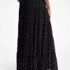 Falda maxi escalonada de georgette con tachuelas