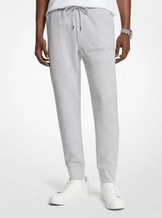 Joggers de mezcla de algodón con logotipo en relieve
