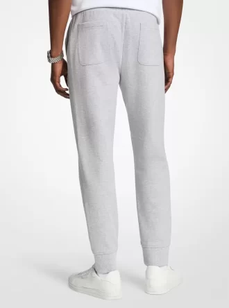Joggers de mezcla de algodón con logotipo en relieve
